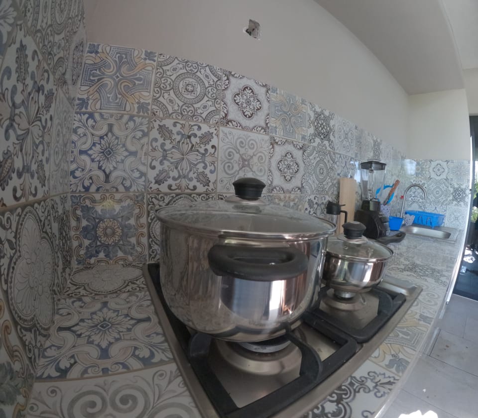 Master Suite 7 | Private kitchen | Full-size fridge, microwave, toaster, blender