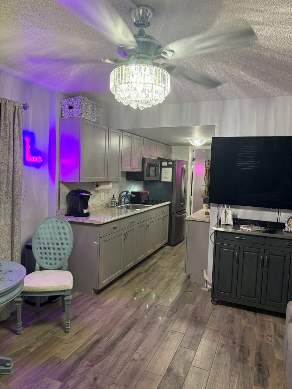 Newer flooring, cabinets, ceiling fans, tile & fixtures make this feel like home