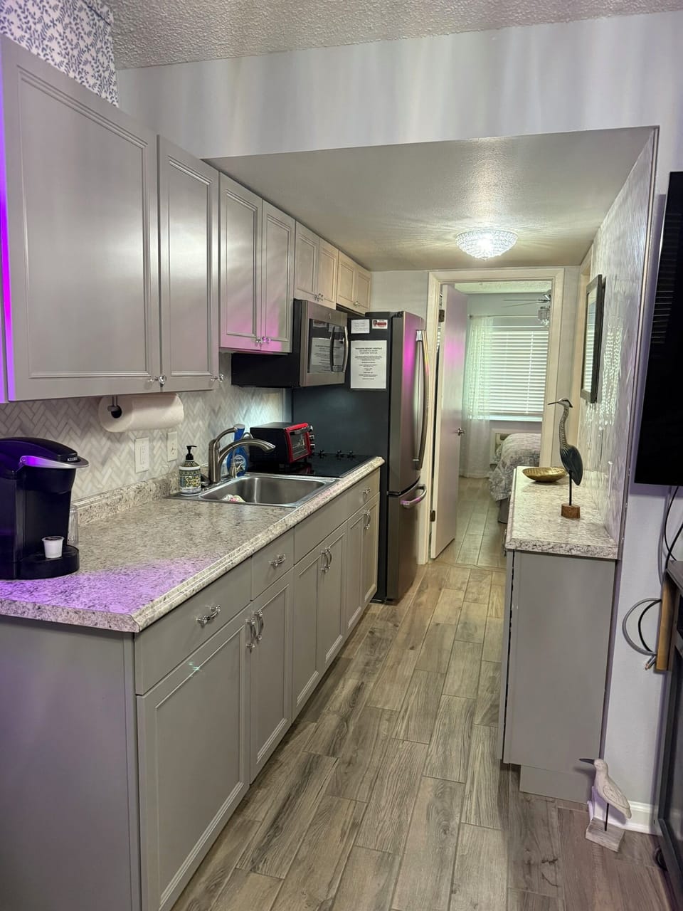 Keurig coffee maker, a stove, toaster oven, counter top oven, and more!