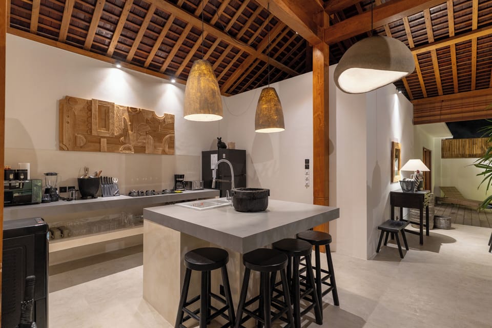 Deluxe Villa, Balcony, Pool View | Private kitchen | Fridge, stovetop, coffee/tea maker, electric kettle