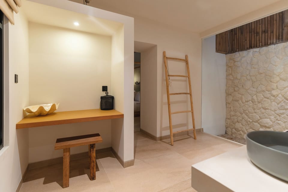 Deluxe Villa, Balcony, Pool View | Bathroom | Rainfall showerhead, hair dryer, bidet, towels