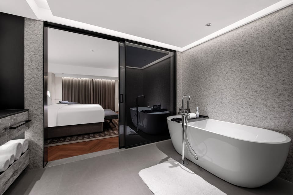 Hair dryer, slippers, towels, shampoo