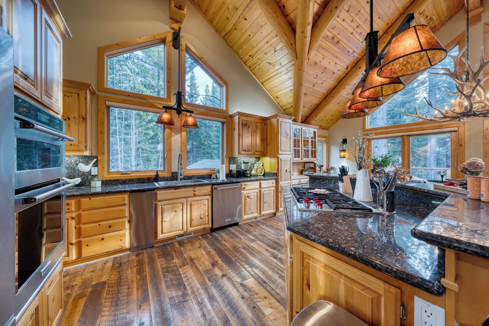 Spacious kitchen equipped with ample counter space and appliances.