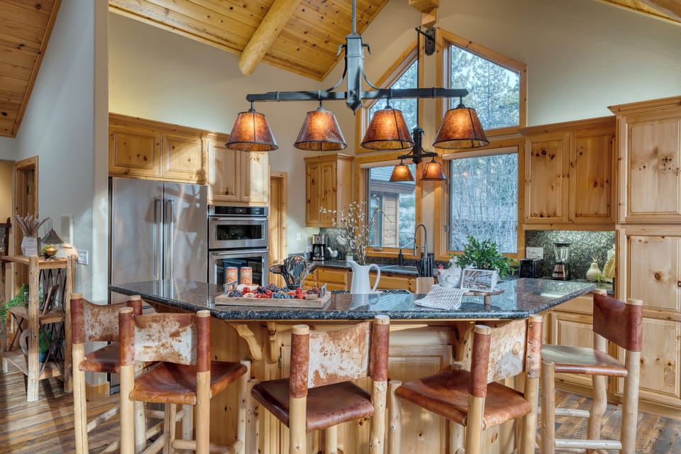 Gather at the kitchen counter for casual dining and conversations.