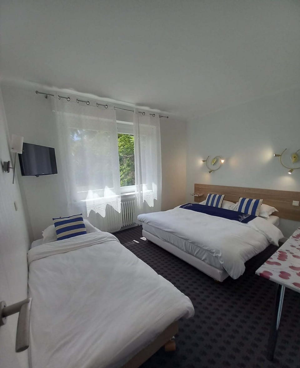 Comfort Triple Room, City View | Desk, blackout drapes, iron/ironing board, free WiFi