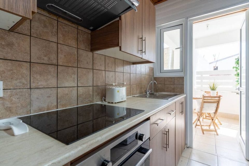 Apartment, 2 Bedrooms, Kitchen, Sea View | Private kitchen | Coffee/tea maker, full-size fridge, microwave, oven