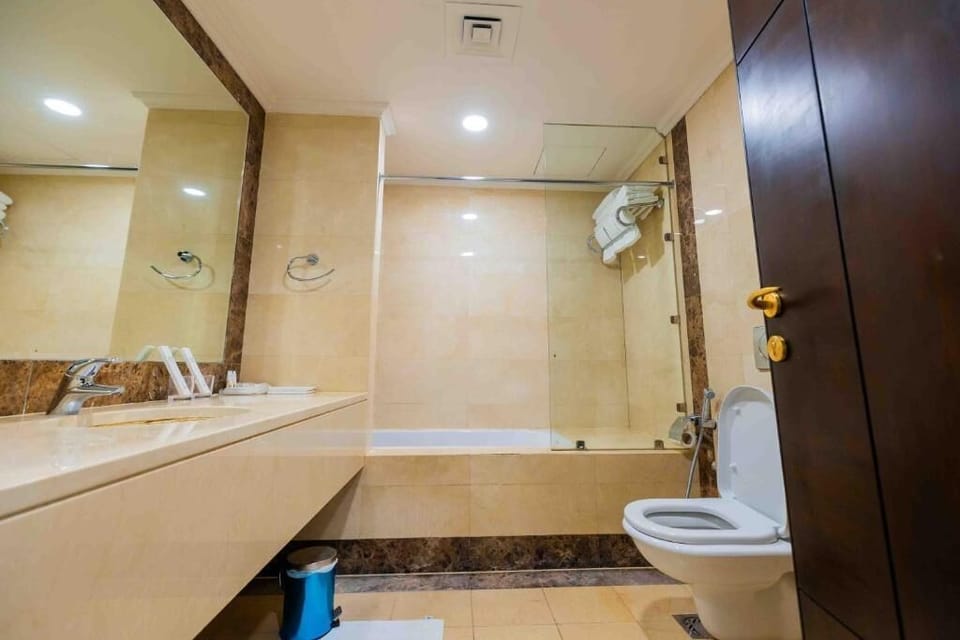 Suite, 2 Bedrooms | Bathroom | Shower, hair dryer, bathrobes, slippers
