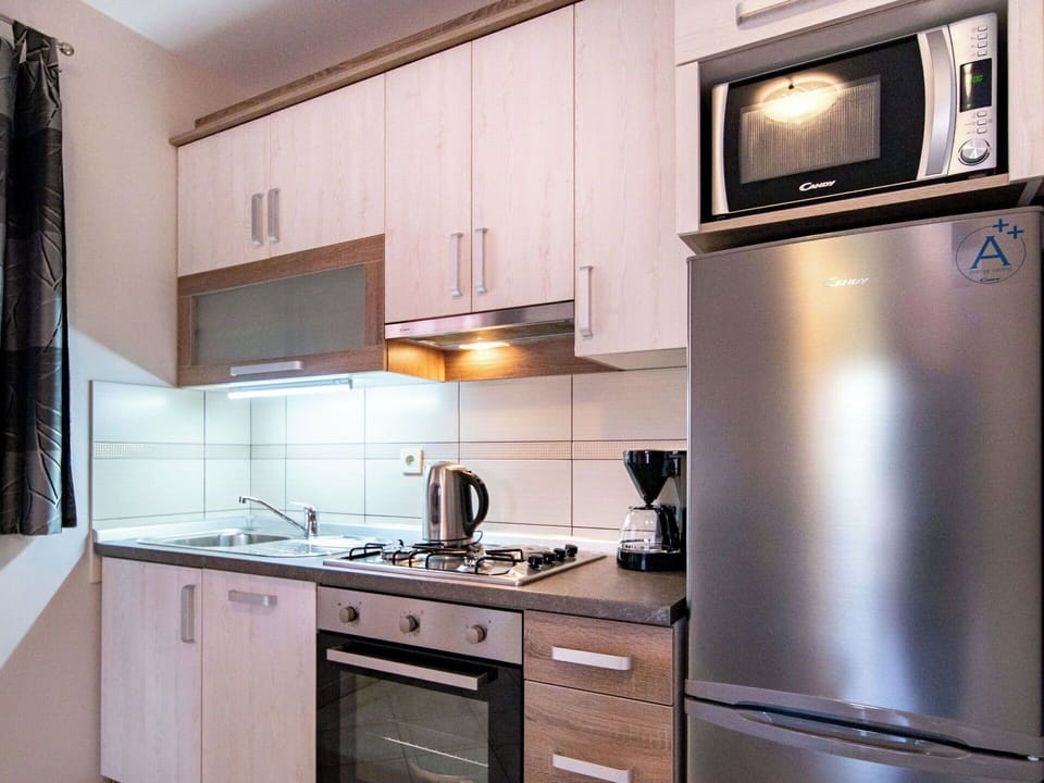 Kitchen Appliance, Major Appliance, Kitchen, Furniture, Interior Design, Cabinetry, Countertop, Wood, Room, Home Appliance