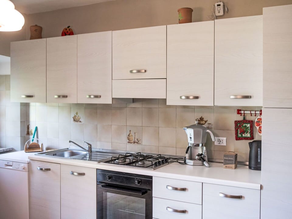 Kitchen, Kitchen Appliance, Cabinetry, Countertop, Major Appliance, Wood, Home Appliance, Furniture, Stove, Flooring