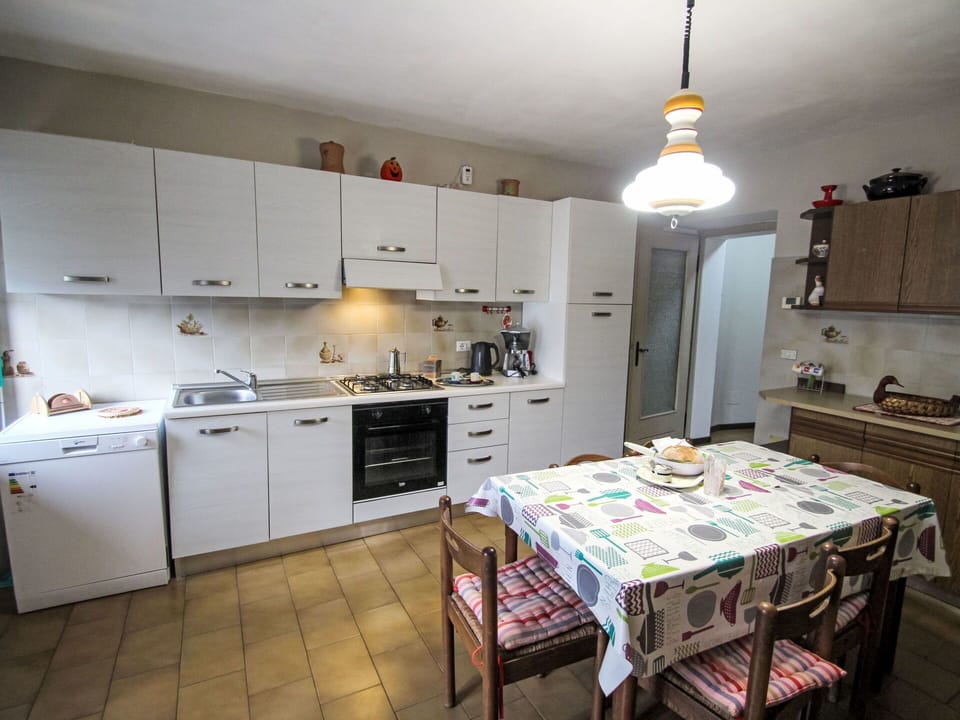 Kitchen, Kitchen Appliance, Countertop, Furniture, Major Appliance, Flooring, Interior Design, Cabinetry, Wood, Floor