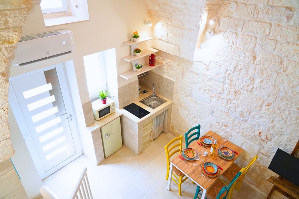 Comfort House, City View | Private kitchen | Fridge, microwave, stovetop, highchair