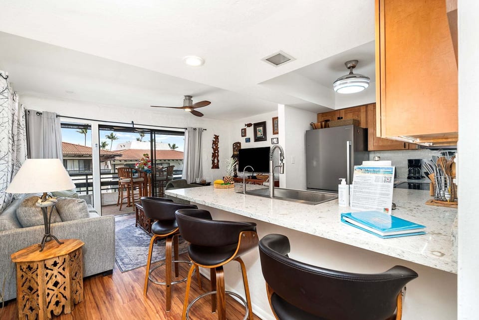 The kitchen is stocked for everyday vacation cooking, whether you are preparing a quick breakfast before heading to the beach or enjoying a relaxed dinner at home