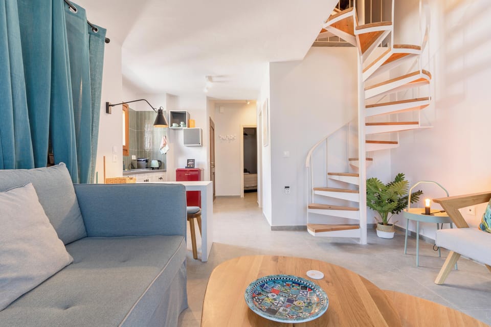 Deluxe Loft, Sea View | Living area | Flat-screen TV