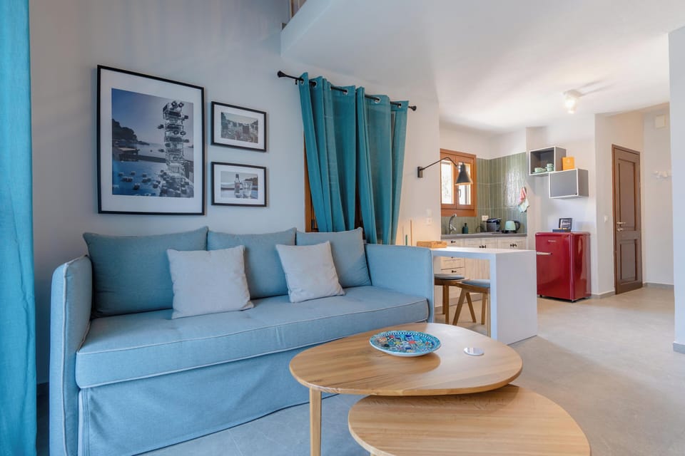 Deluxe Loft, Sea View | Living area | Flat-screen TV