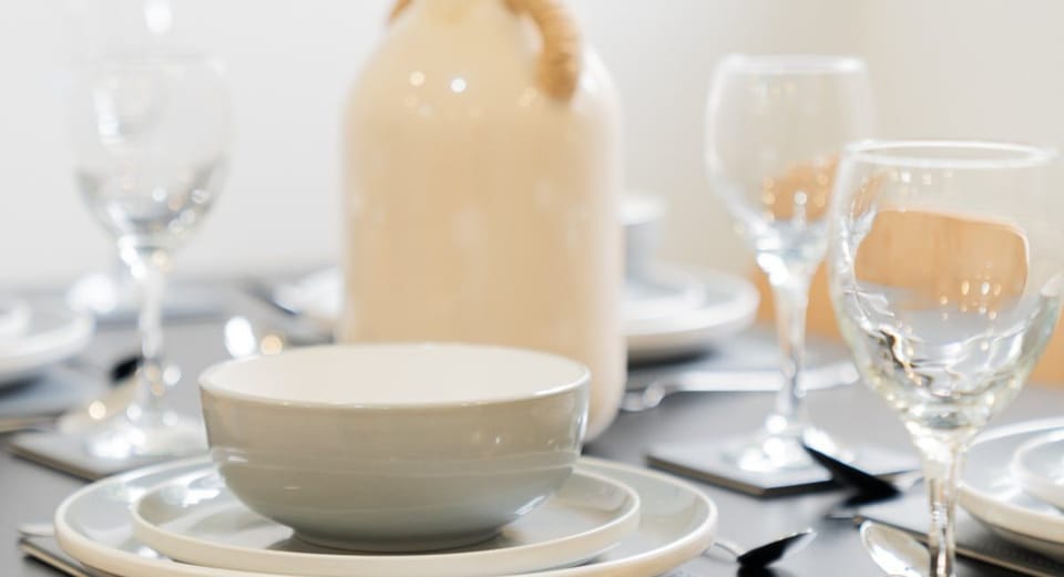 Thoughtfully styled dining area with a welcoming setup, creating a warm and comfortable space to enjoy meals together.
