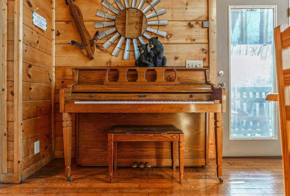 Piano nook awaits. And, create beautiful melodies amidst rustic charm and nature-inspired accents!