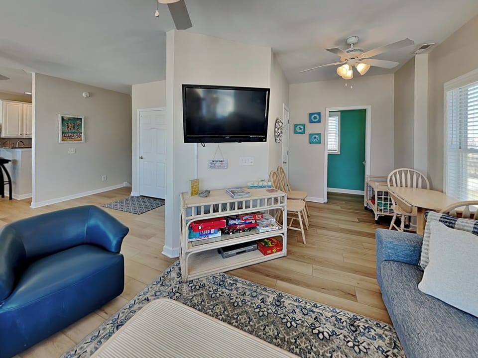 Living Room - Smart TV + Half Bathroom Access