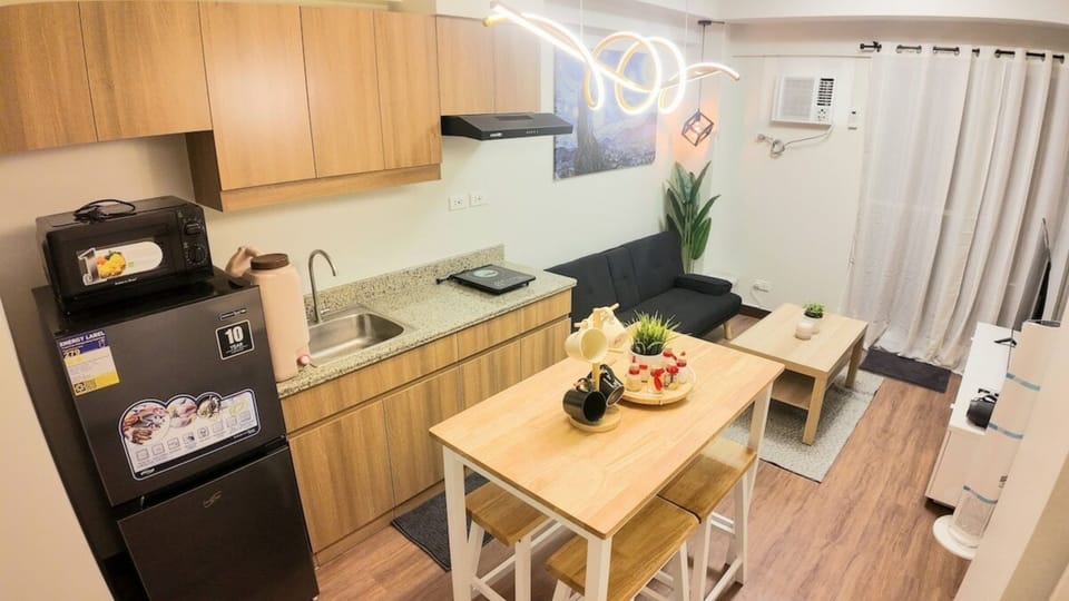 Comfort Condo, 1 Bedroom, Balcony, City View | Private kitchenette | Fridge, microwave, stovetop, coffee/tea maker