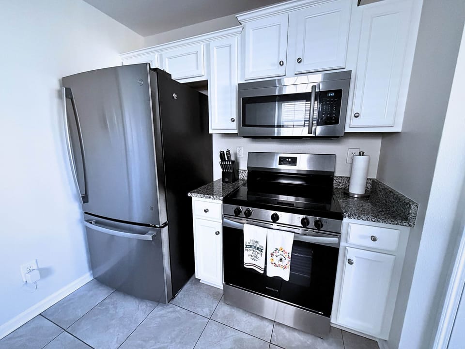 Plenty of fridge space, freezer with ice, microwave and range.