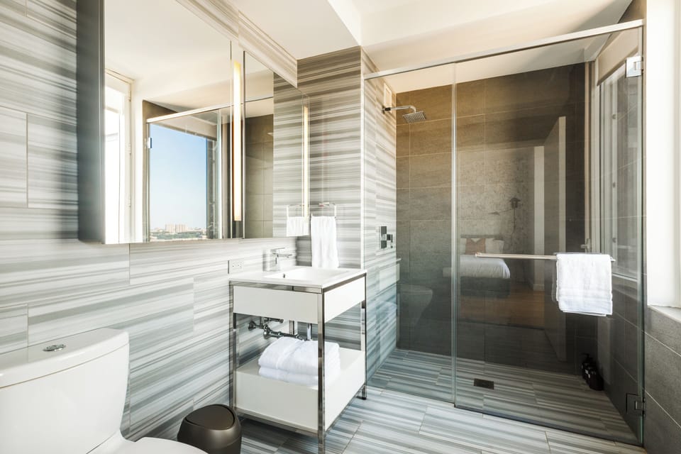 Luxury Suite, City View | Bathroom | Free toiletries, hair dryer, towels, soap