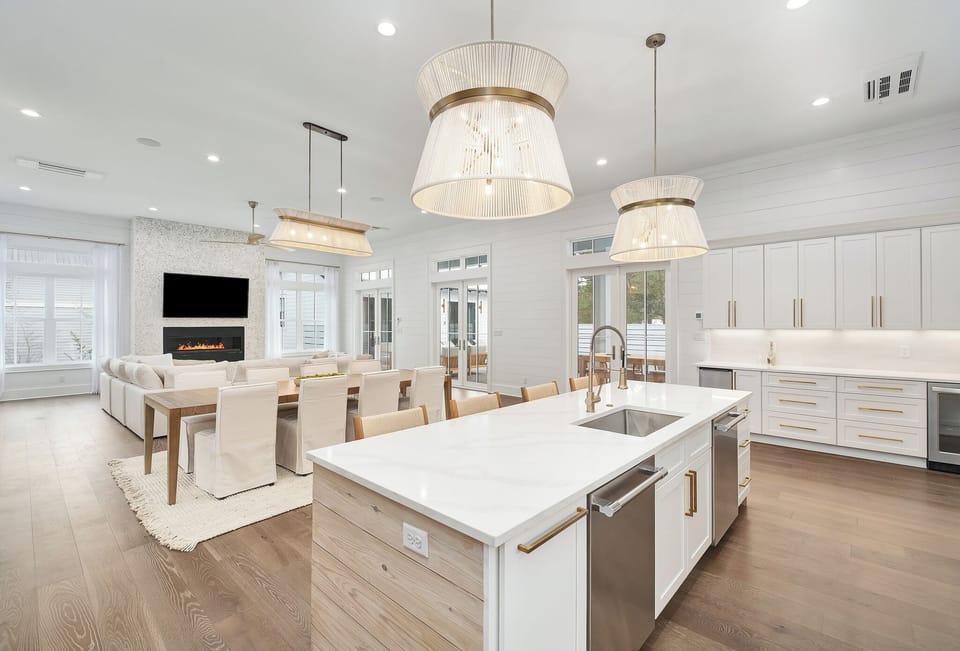 Step into this stunning open-concept space where your gourmet kitchen flows seamlessly into the cozy living area with fireplace.
