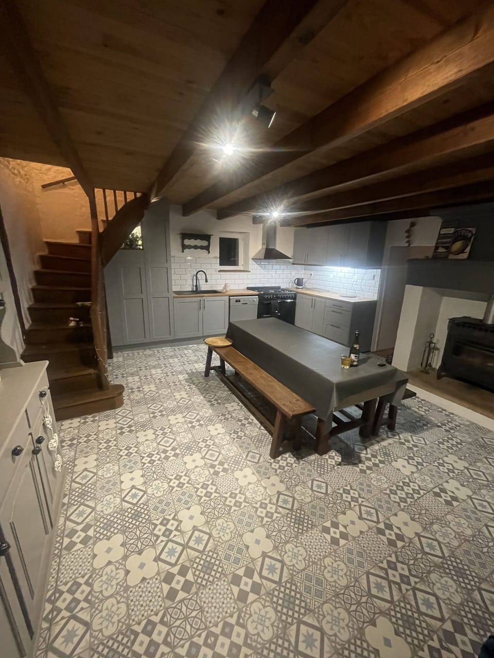 Kitchen with stairs to attic room.