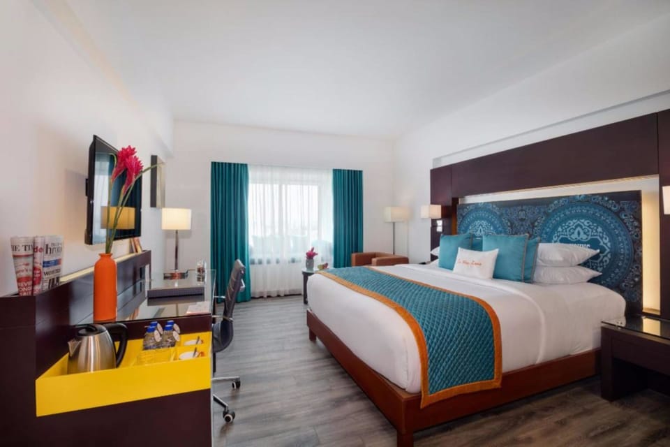Zone Room | 1 bedroom, minibar, in-room safe, desk