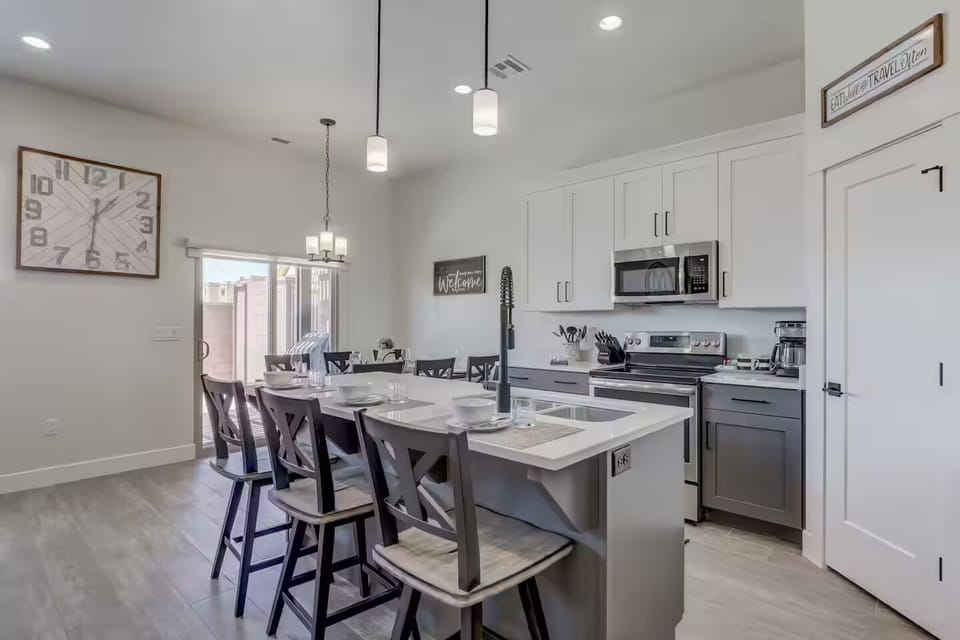 Chef’s dream kitchen, complete with stainless steel appliances and a breakfast bar.