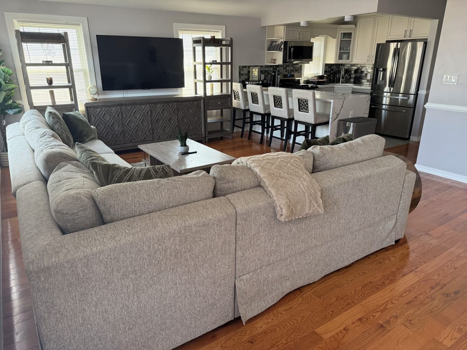 Living Room/Kitchen Open Concept/w L-Sectional Sofa, 75" Smart TV, Coffee Table
