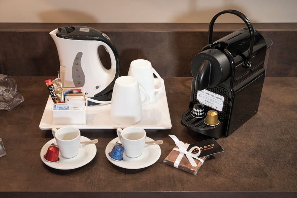 Premium bedding, down comforters, minibar, in-room safe