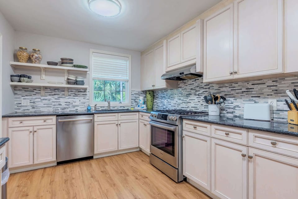 Spacious living area with abundant sunlight. Perfect for unwinding after a day at the beach.