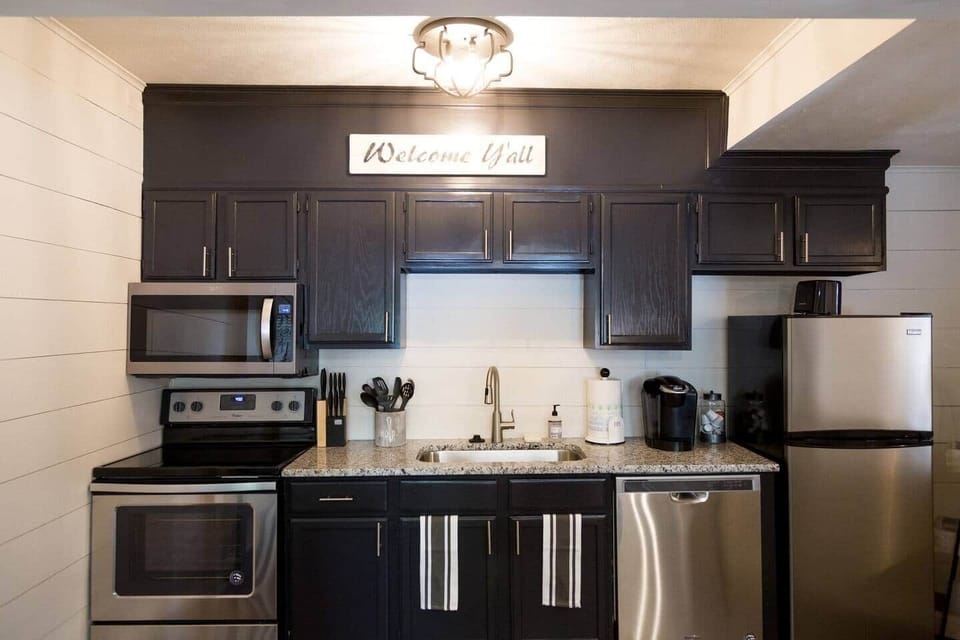 Kitchen with stainless steel appliances.
