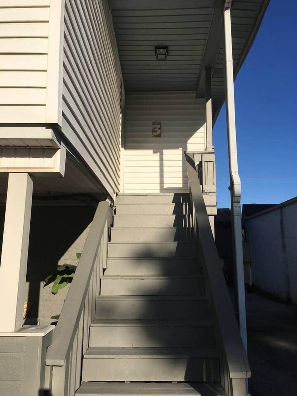 This unit is on the 2nd floor, up the stairs at the back of the house.