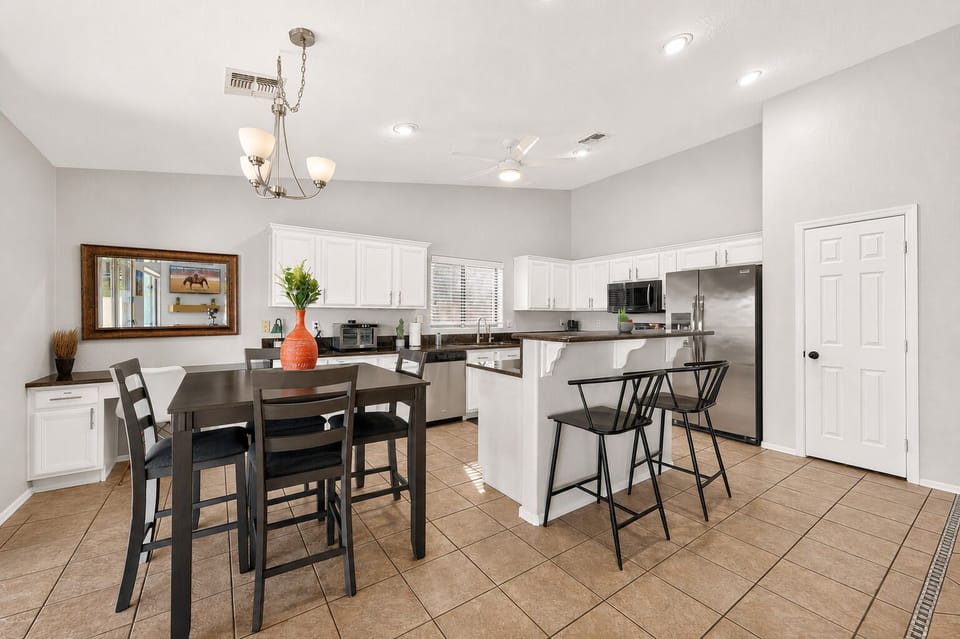 The island and dining area offers a dynamic dining experience.