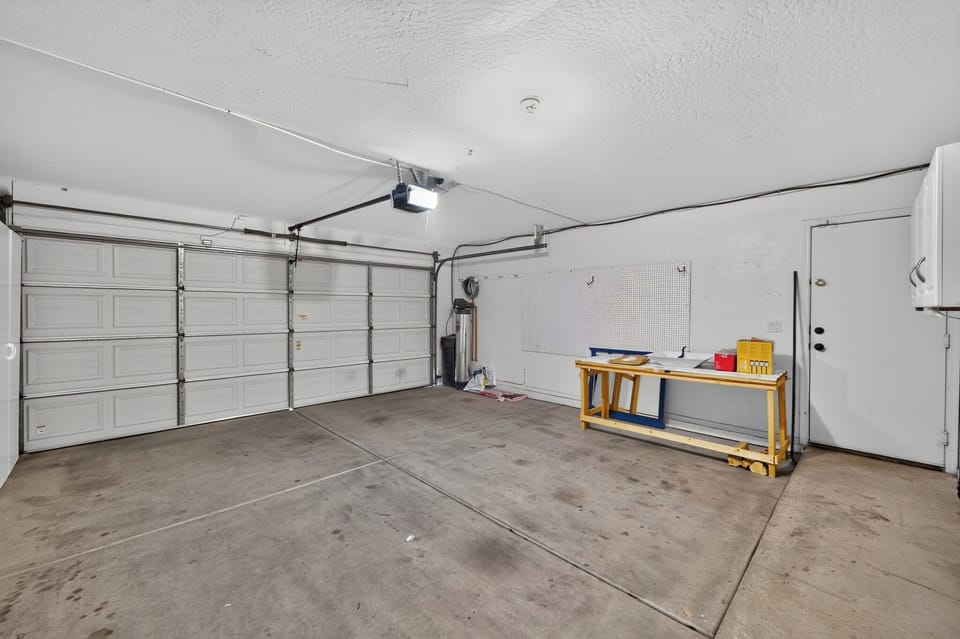 Between the garage and driveway, there's enough parking space for 3 cars.
