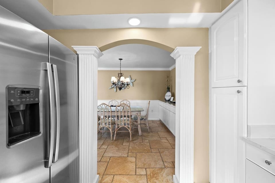 Convenient refrigerator available for storing drinks, snacks, and groceries during your stay.