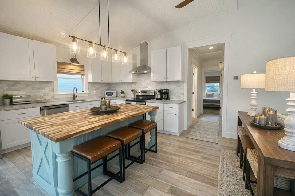 Kitchen with custom island for dining and prepping, stools for 6