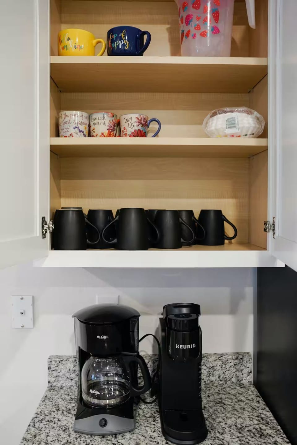 Fully stocked kitchen with coffee options. 