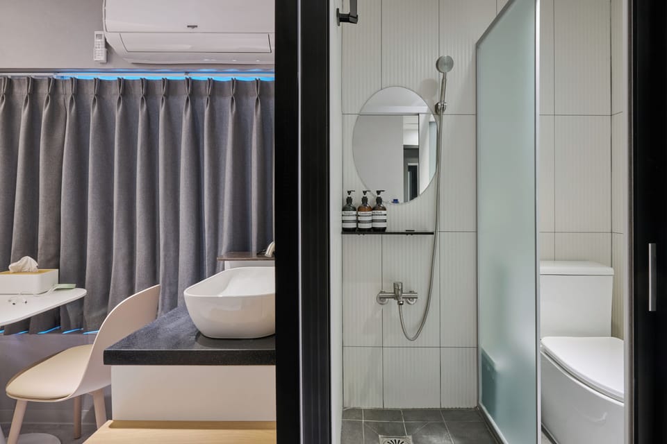 Family Triple Room | Bathroom | Shower, hair dryer, towels, soap