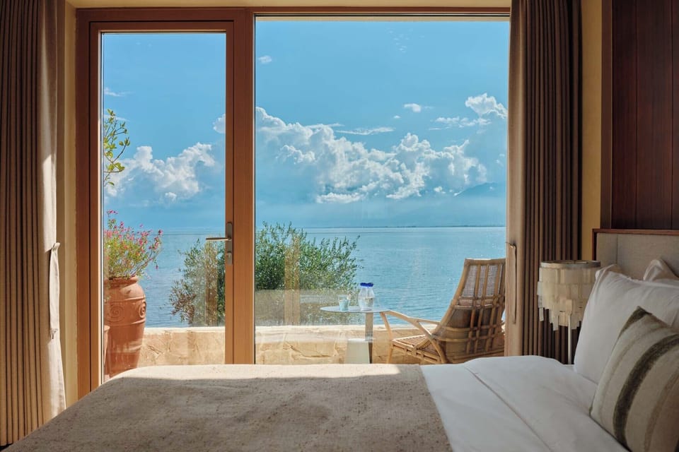 Traditional Double Room, Patio, Sea View | Minibar (free items), desk, laptop workspace, blackout drapes