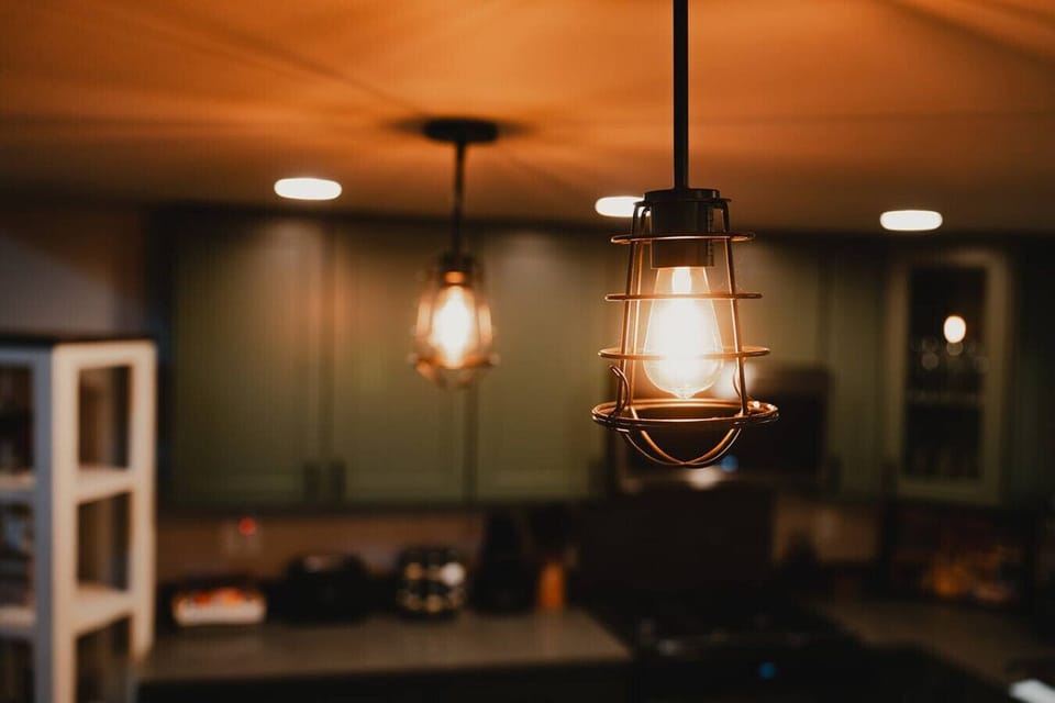 Kitchen - decorative lighting above the kitchen island.