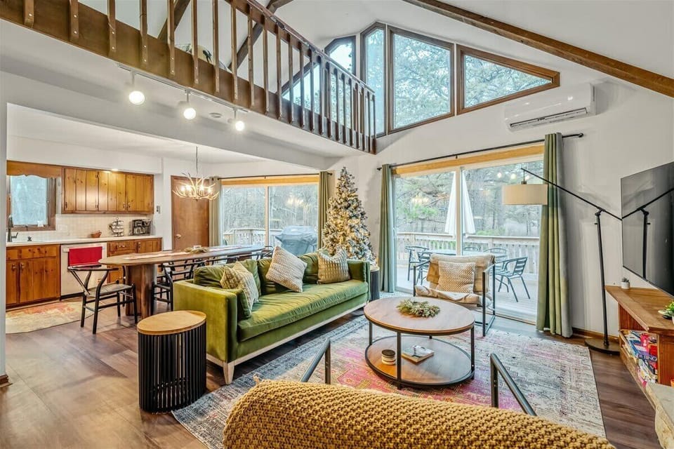 Living Room: Bright and airy space with stunning views, modern décor, and ample seating for relaxation!