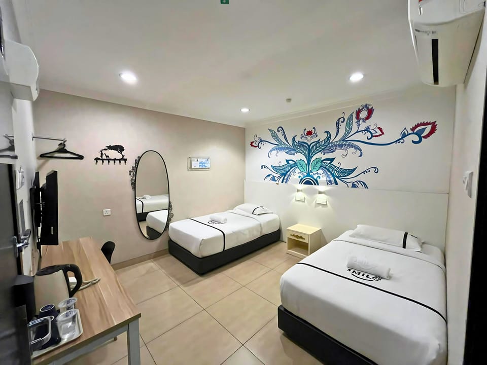 Twin Room | Desk, iron/ironing board (on request), WiFi (free), bed sheets