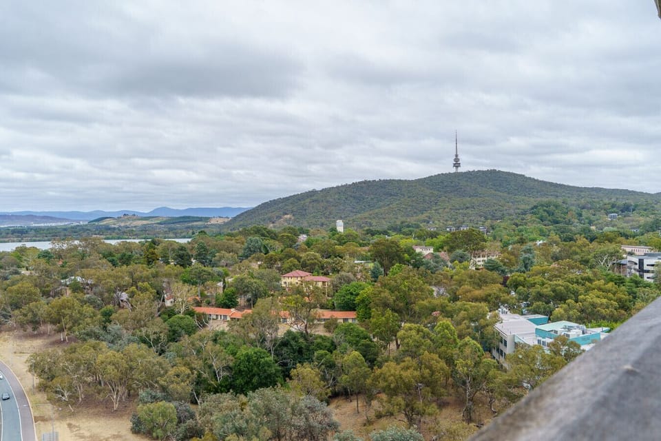 Gaze out over the Canberra landscape from your elevated retreat, where the urban pulse meets mountain horizons.