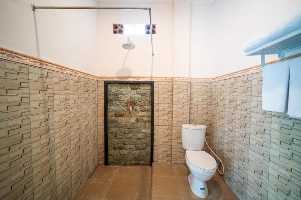 Double Room, Pool View | Bathroom | Shower, bathrobes, slippers, bidet