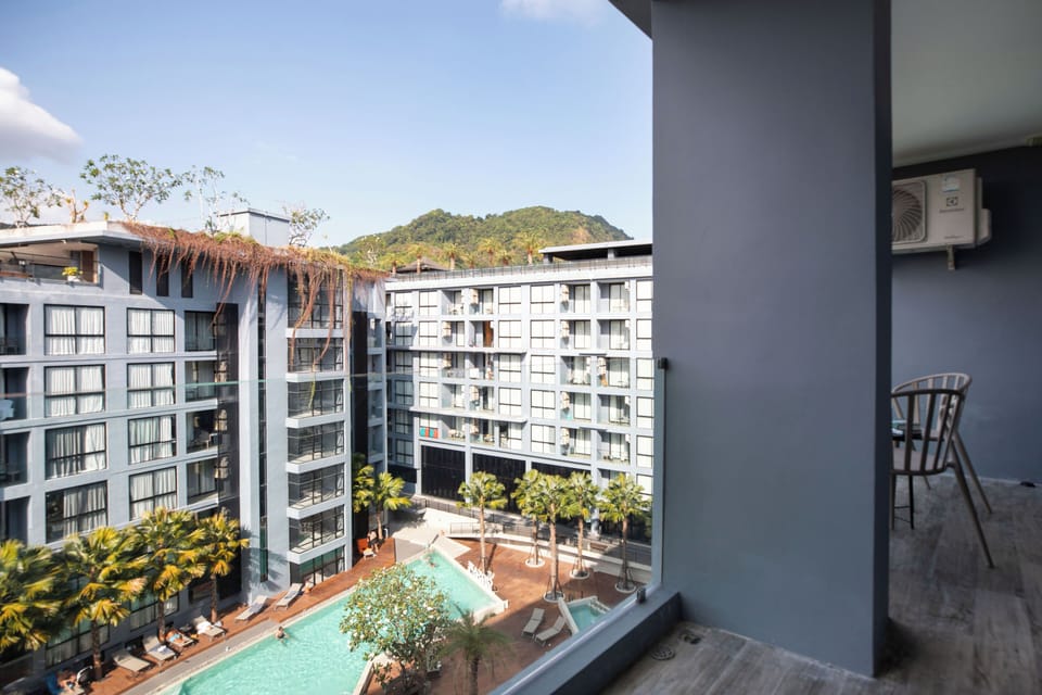 Deluxe Condo, Balcony, Pool View | Exterior