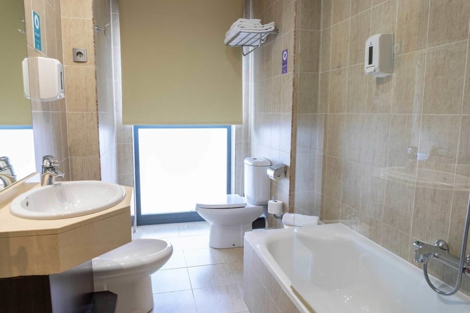 Hair dryer, towels, soap, shampoo