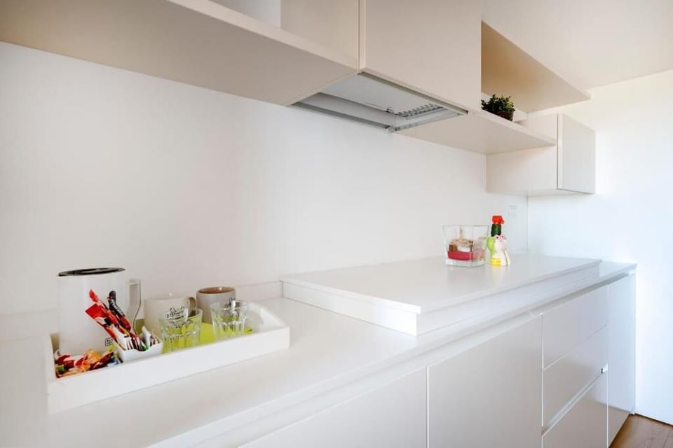 Deluxe Triple Room, City View | Private kitchen | Espresso maker, coffee/tea maker, electric kettle