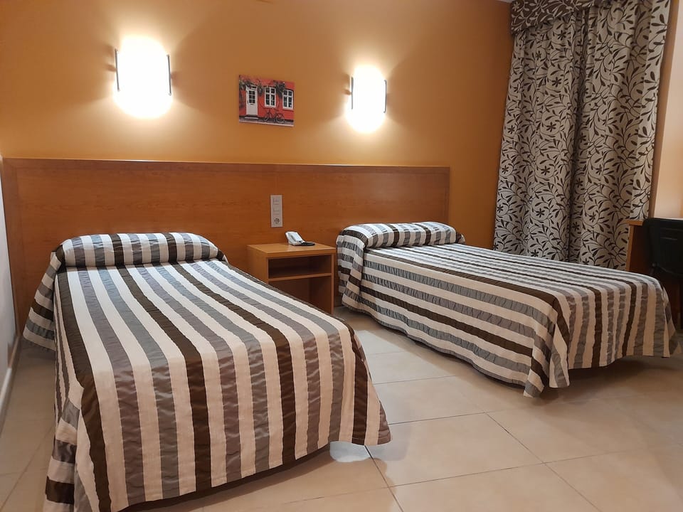 Comfort Twin Room, City View | Desk, laptop workspace, free WiFi