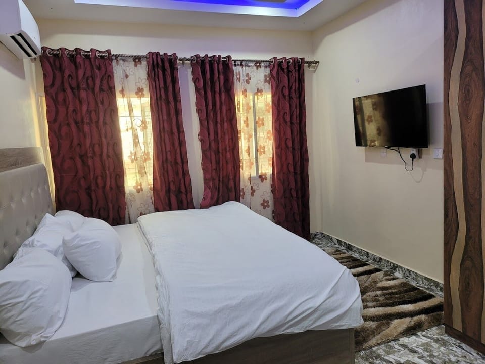 Economy Room, Balcony, City View | Desk, laptop workspace, blackout drapes, soundproofing